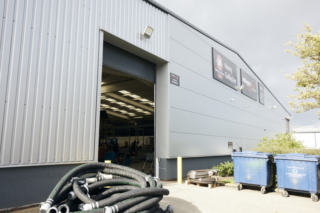 warehouse with equipment outside