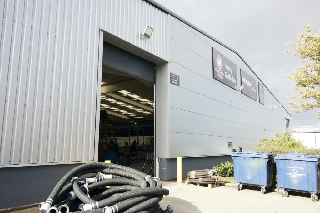 warehouse with equipment outside